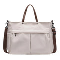 Nylon crossbody tote bag in black grey white green colours showing dimensions 39x28cm