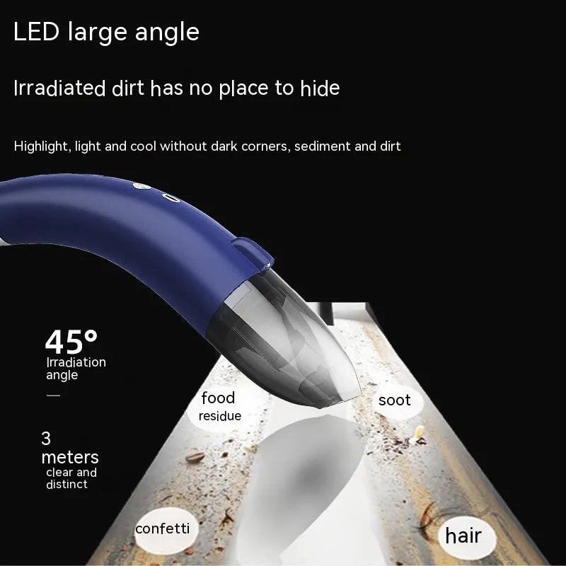 Handheld portable car vacuum cleaner in black with USB charging cable and dust collection compartment