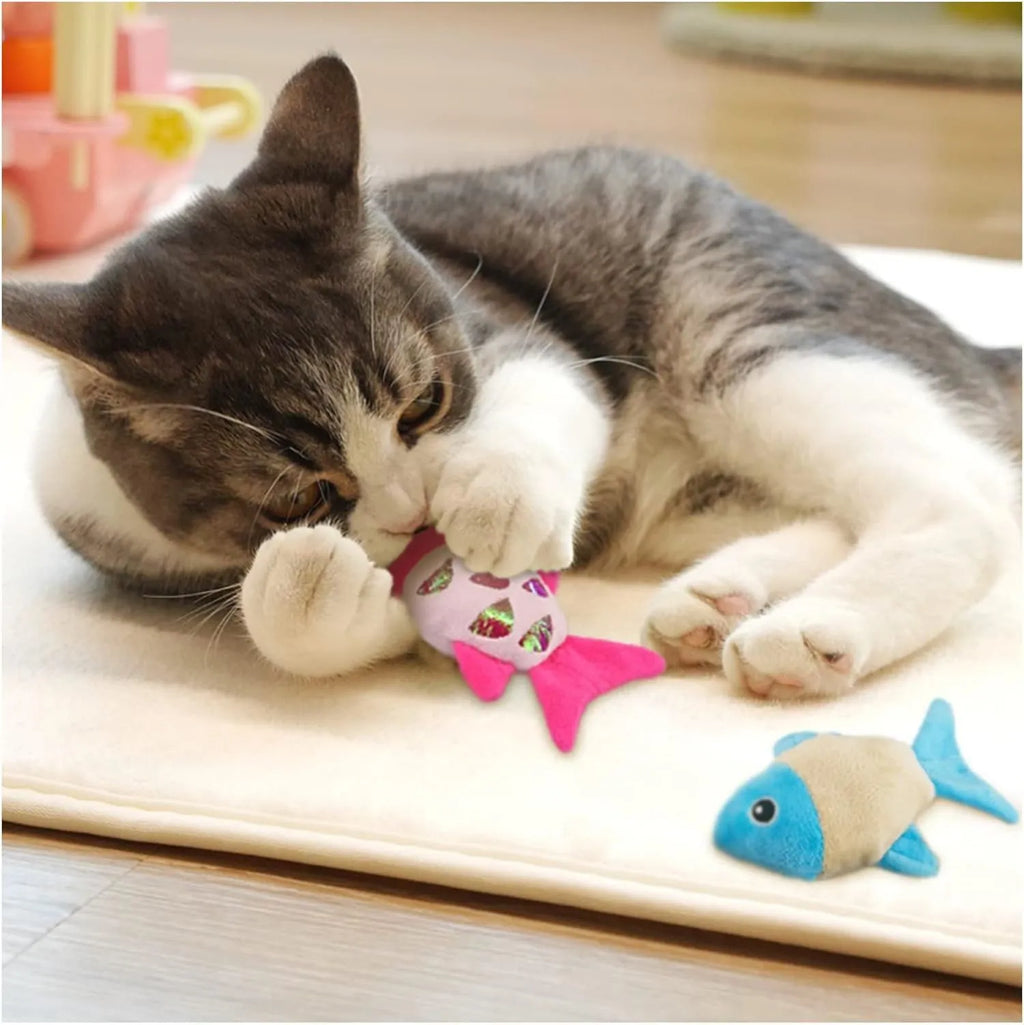 Two small fish-shaped cat toys with plush exterior in assorted colours