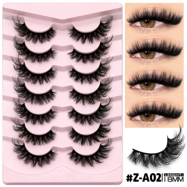 Box of artificial fibre false eyelashes in a natural long thick style with adhesive glue.