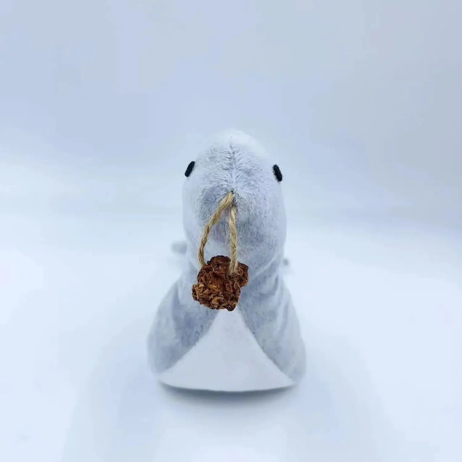 Blue sea lion shaped plush cat toy with bell, catnip section and teeth grinding texture