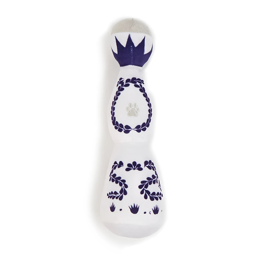 Red and white tequila bottle plush dog toy with squeaker for dogs of all sizes