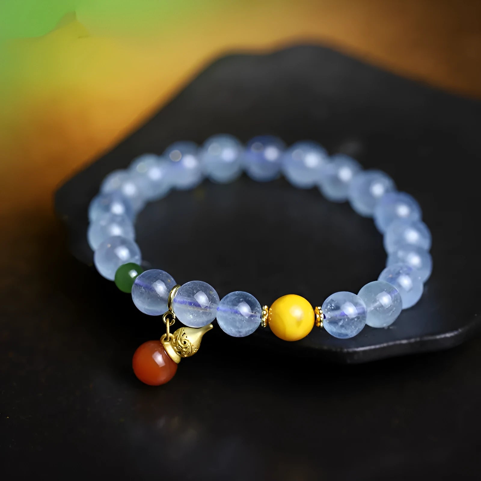 Iced aquamarine crystal bracelet with geometric arrangement of 8mm stones and adjustable cord