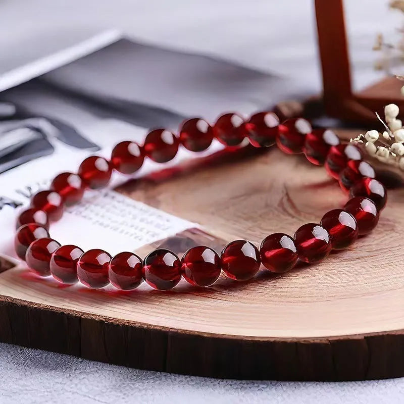 Chinese-style gourd bracelet with imitation garnet beads and Fu character symbols on U-shaped electroplated setting