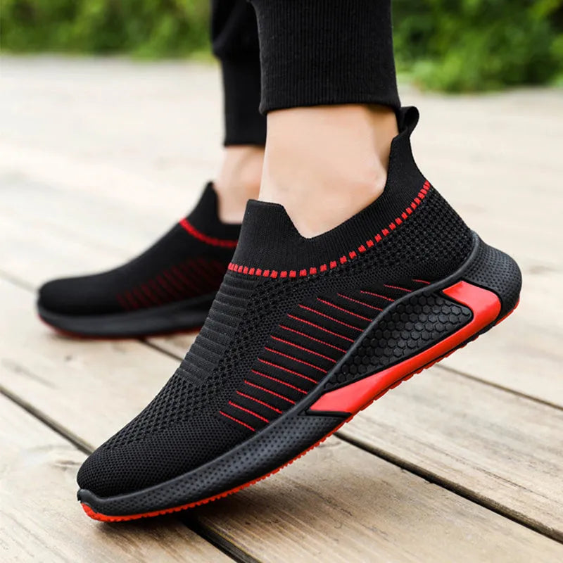 Men's black and white striped mesh slip-on sneakers with flyknit upper and lace-up front