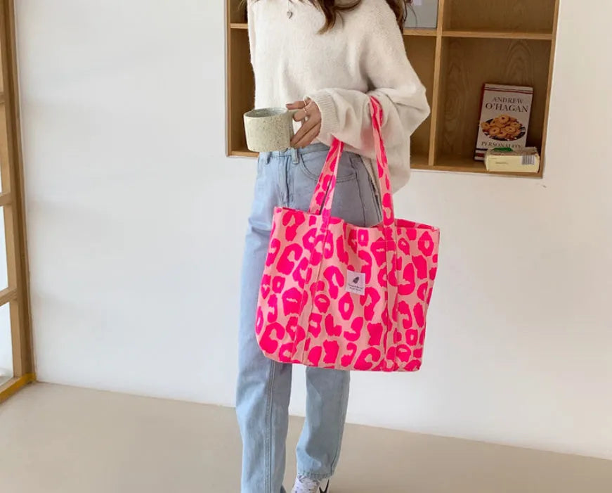 Women's large canvas shoulder bag with three-dimensional pockets in contrasting colours