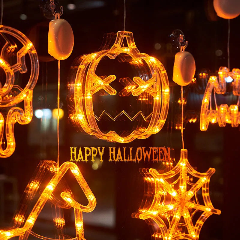 Halloween window hanging LED lights set with seven battery-powered horror-themed decorative pieces