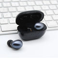 Black wireless Bluetooth stereo earbud headset with subwoofer for calls and music
