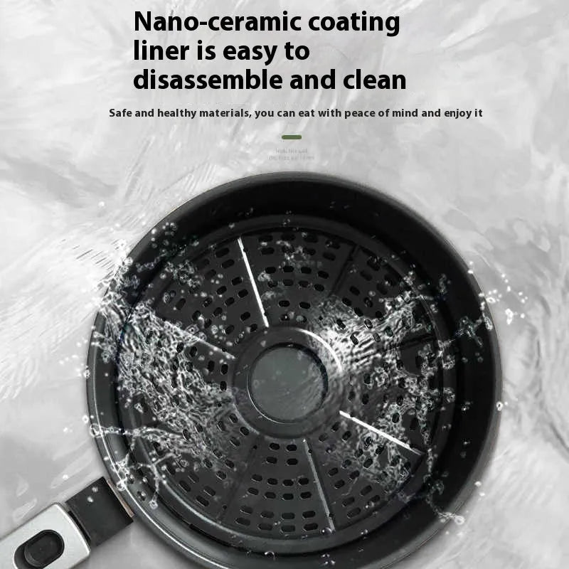 Silver mechanical button air fryer with transparent lid showing 8-litre nano-ceramic cooking basket inside.