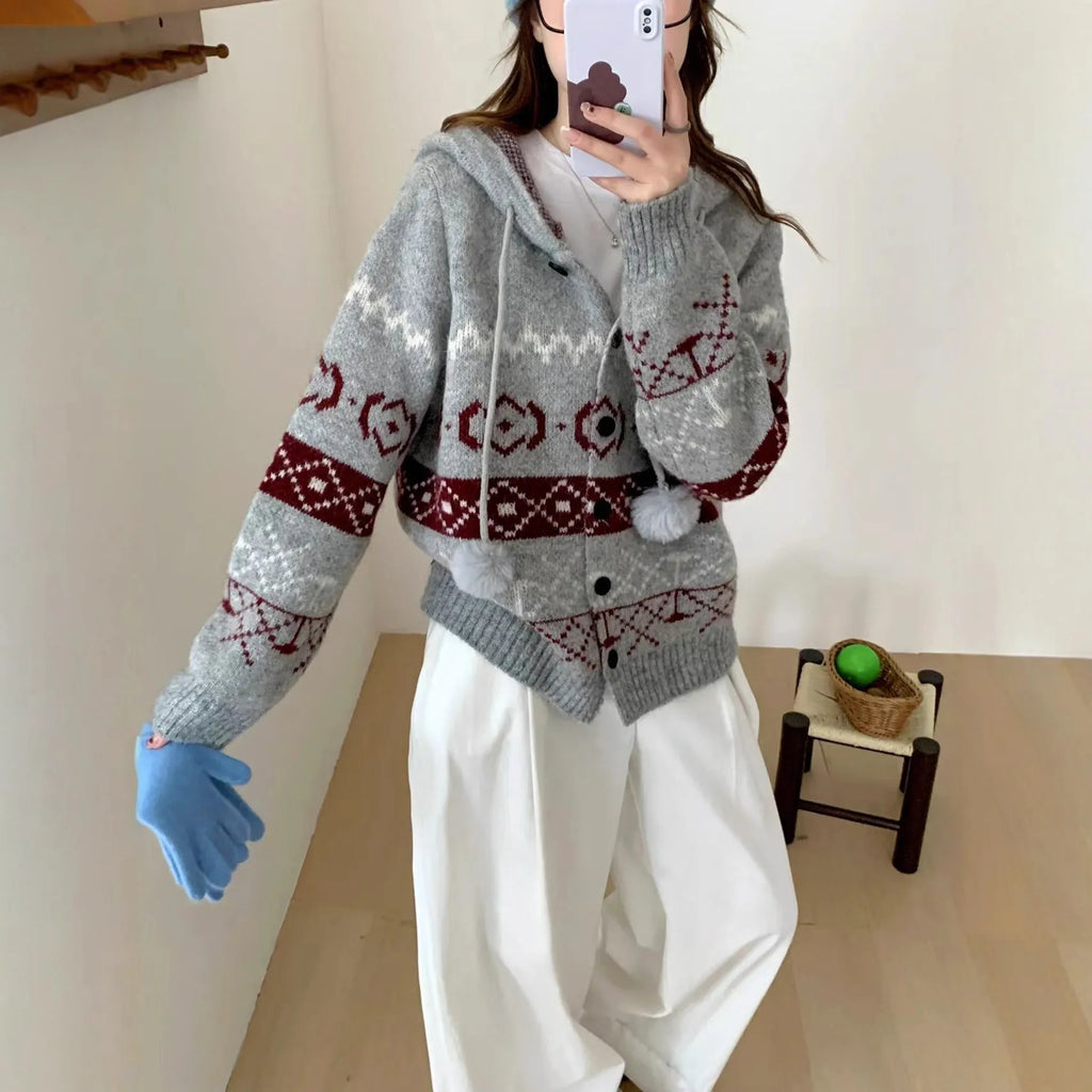 Geometric patterned acrylic brocade sweater coat in grey, loose fit with long sleeves.