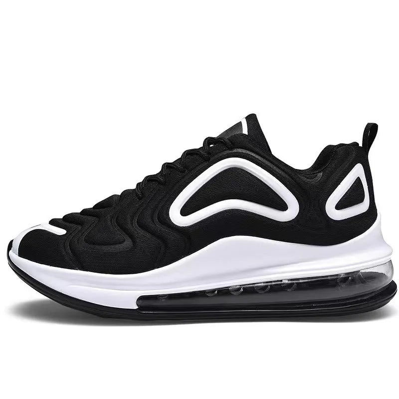 Men's black casual sneakers with lace-up front and thick sole.