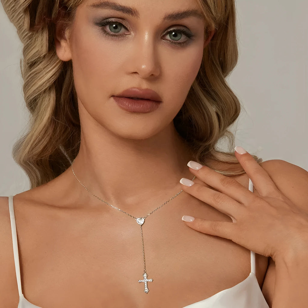 Silver love cross necklace with V-shaped pendant on an O-ring chain, colour BSN384.