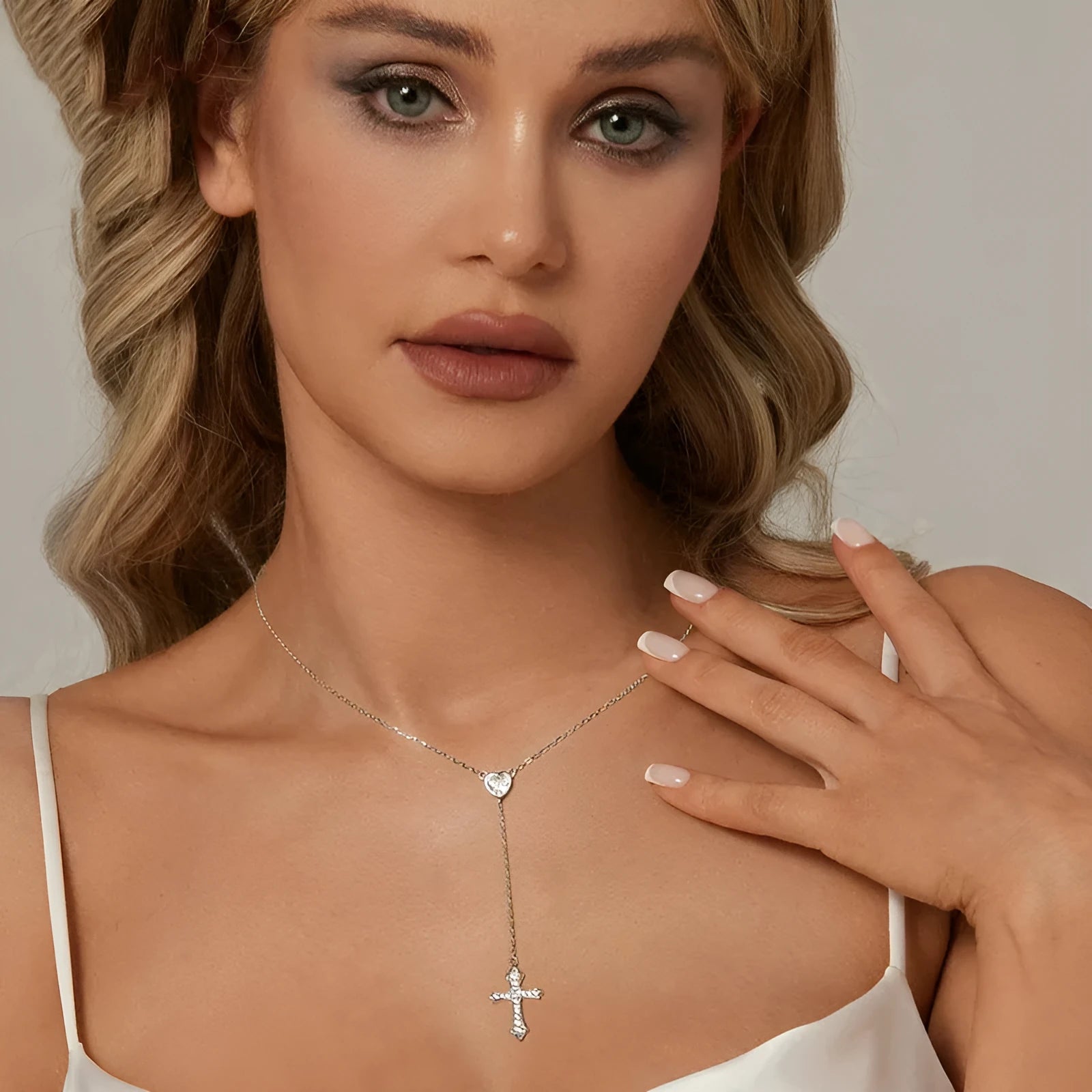 Silver love cross necklace with V-shaped pendant on an O-ring chain, colour BSN384.