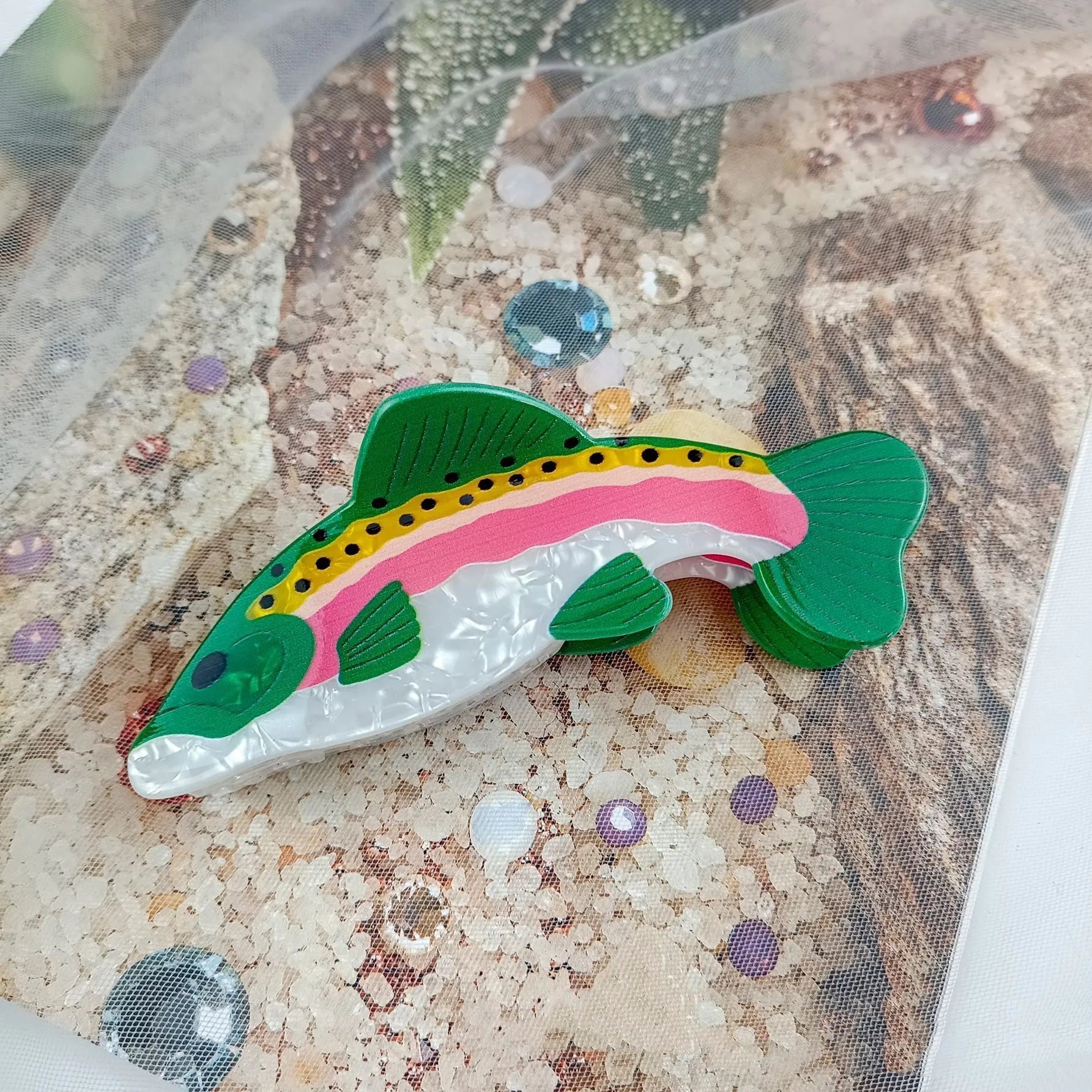 Dark green PVC hair clip with rainbow trout fish design inspired by carp elements