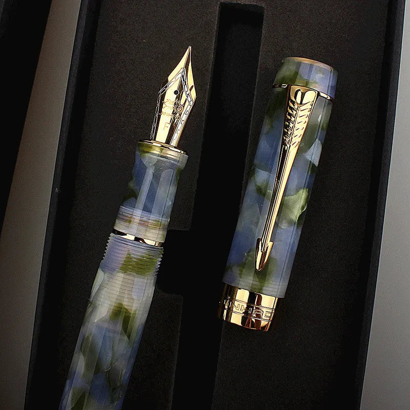 Deep bath green metal ballpoint pen with three interchangeable nib options shown