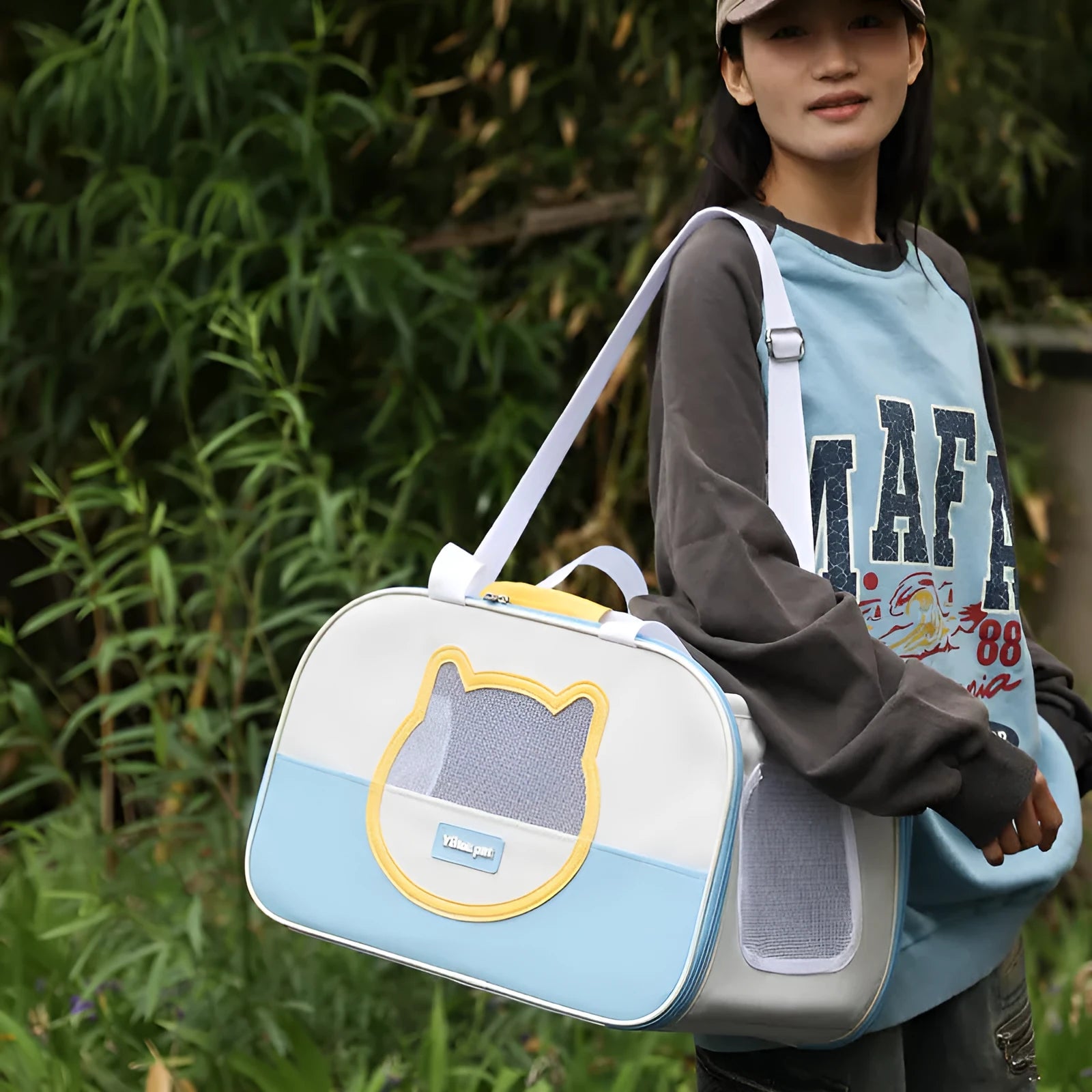 Foldable cat backpack carrier in Oxford cloth with large capacity and breathable design for pet transport