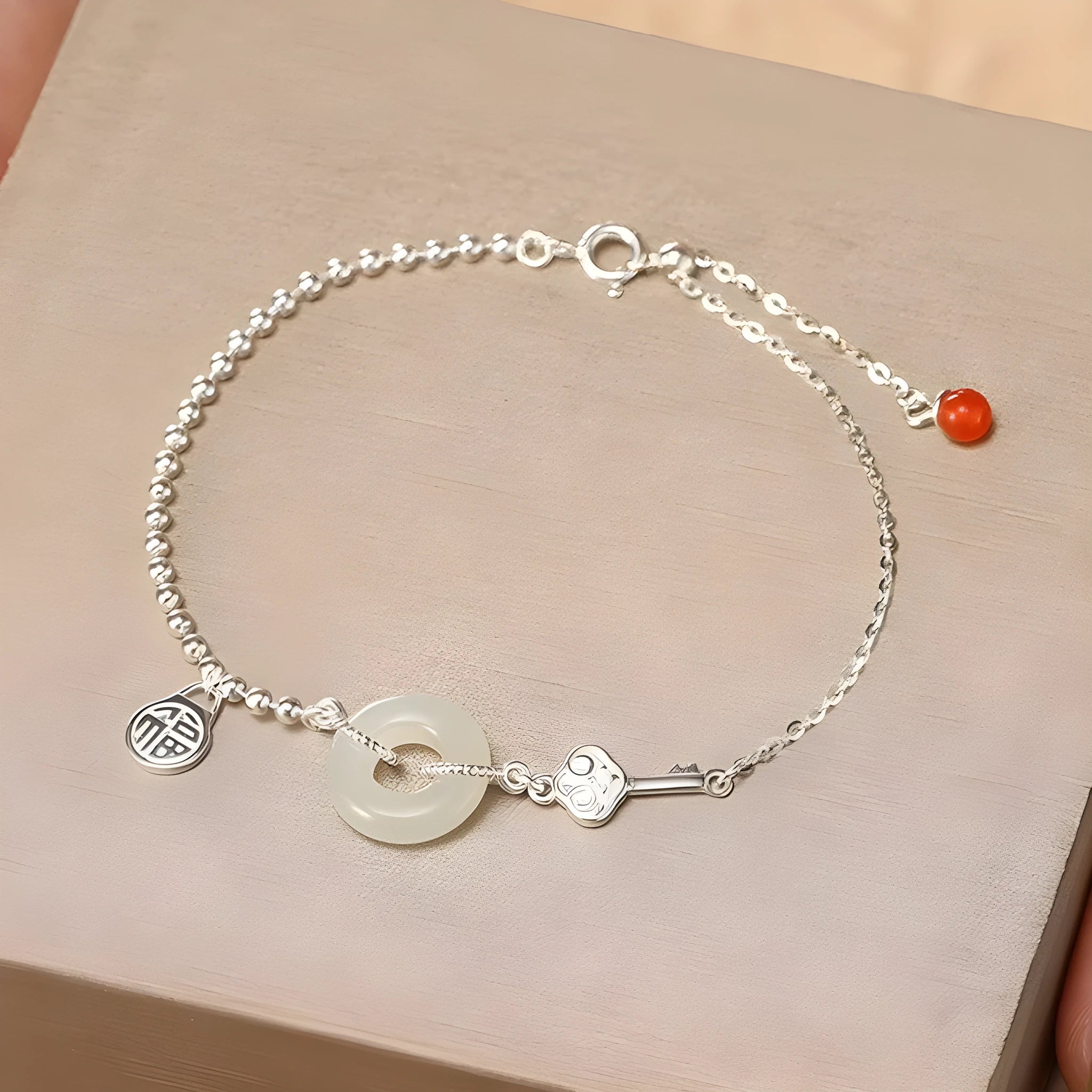 Women's Chinese style Hetian jade bracelet in 925 silver with geometric design and electroplated finish