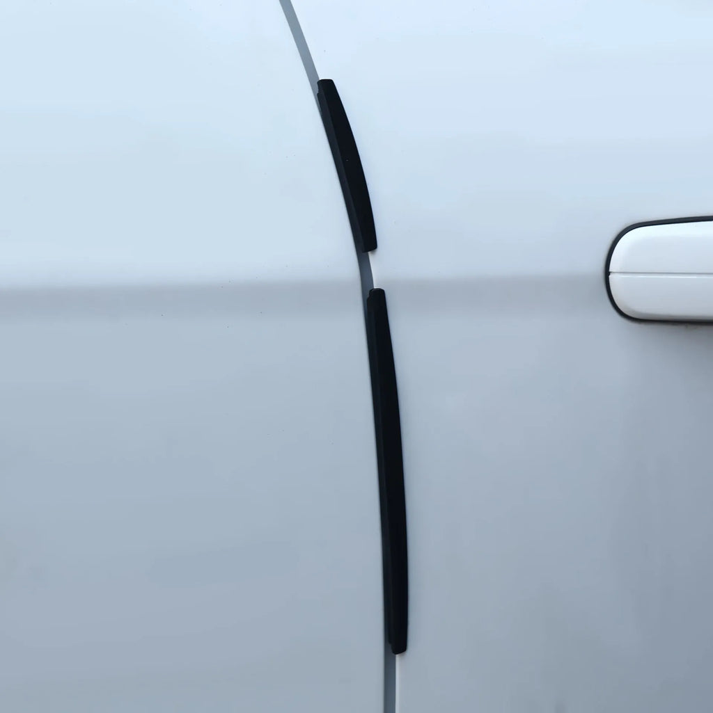 White self-adhesive PVC car door edge protector strip, 1000mm long, on a car door.