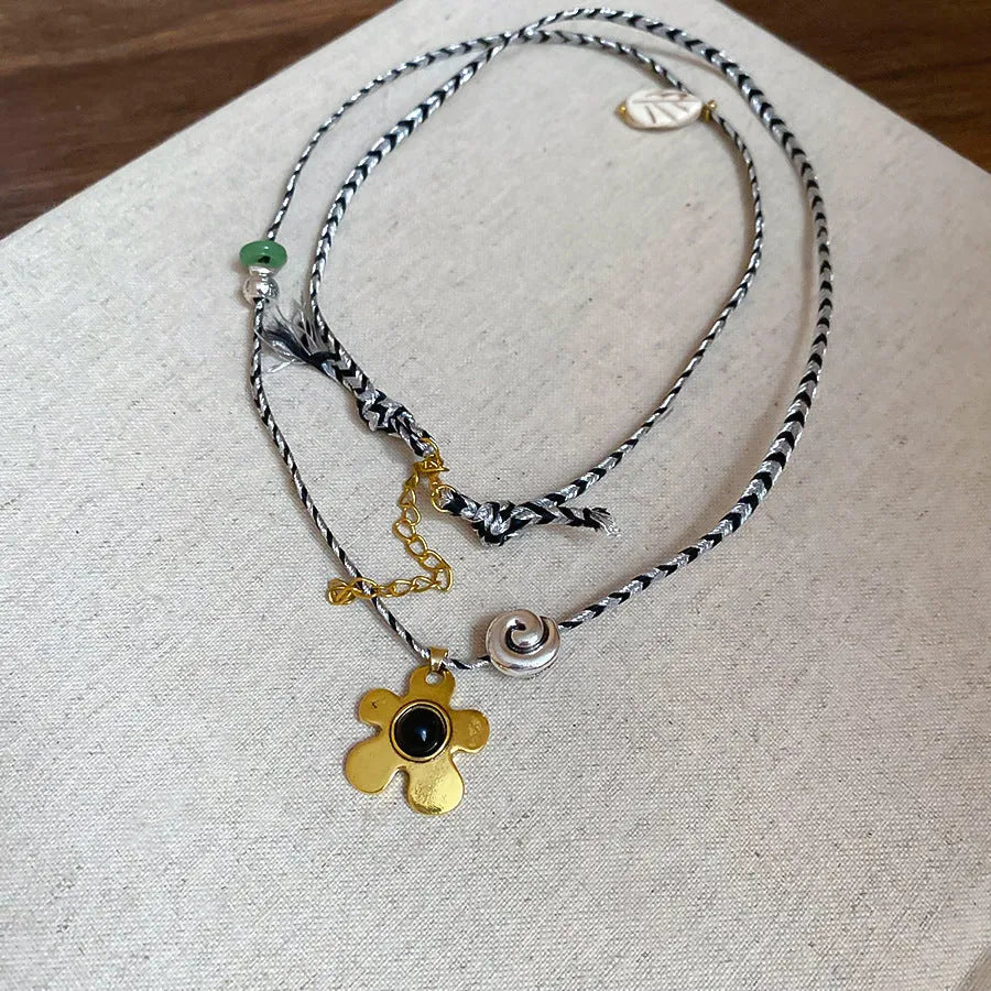 Stone shell beaded flower pendant necklace on adjustable chain with ethnic style design