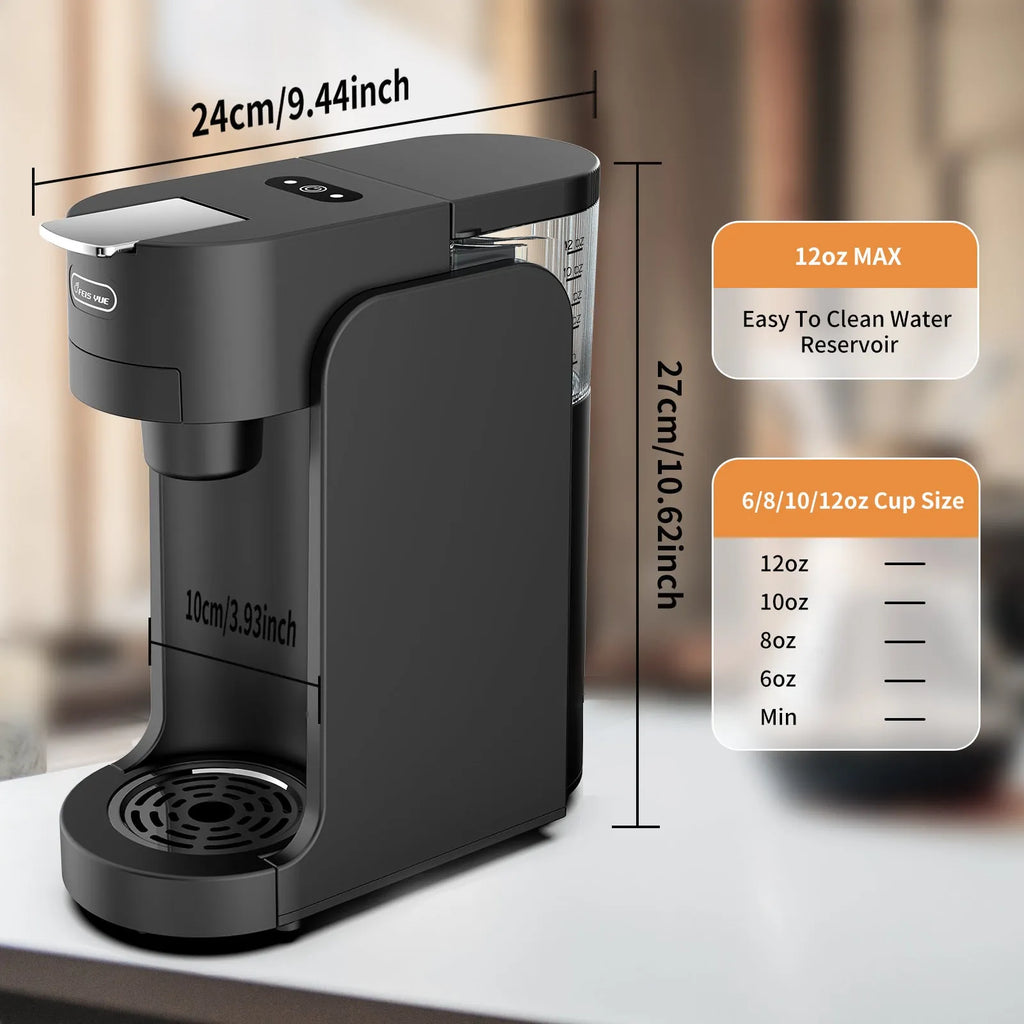 Compact black and white capsule coffee machine with transparent water tank and adjustable stainless steel drip tray.