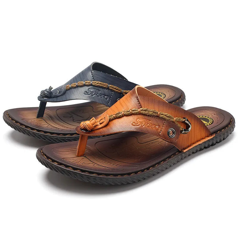 Men's dark blue herringbone pattern outdoor slippers with a rubber sole and leather lining.