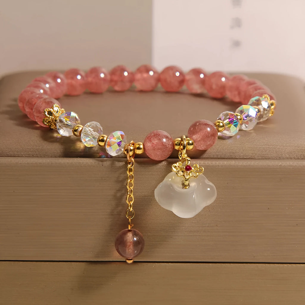 Women's natural crystal bracelet with strawberry quartz beads, white agate beads, and traditional auspicious cloud charm