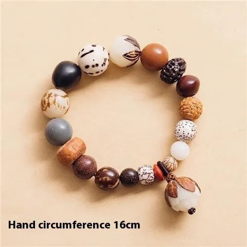 Women's 18-seed Bodhi bead bracelet with elastic cord and geometric design