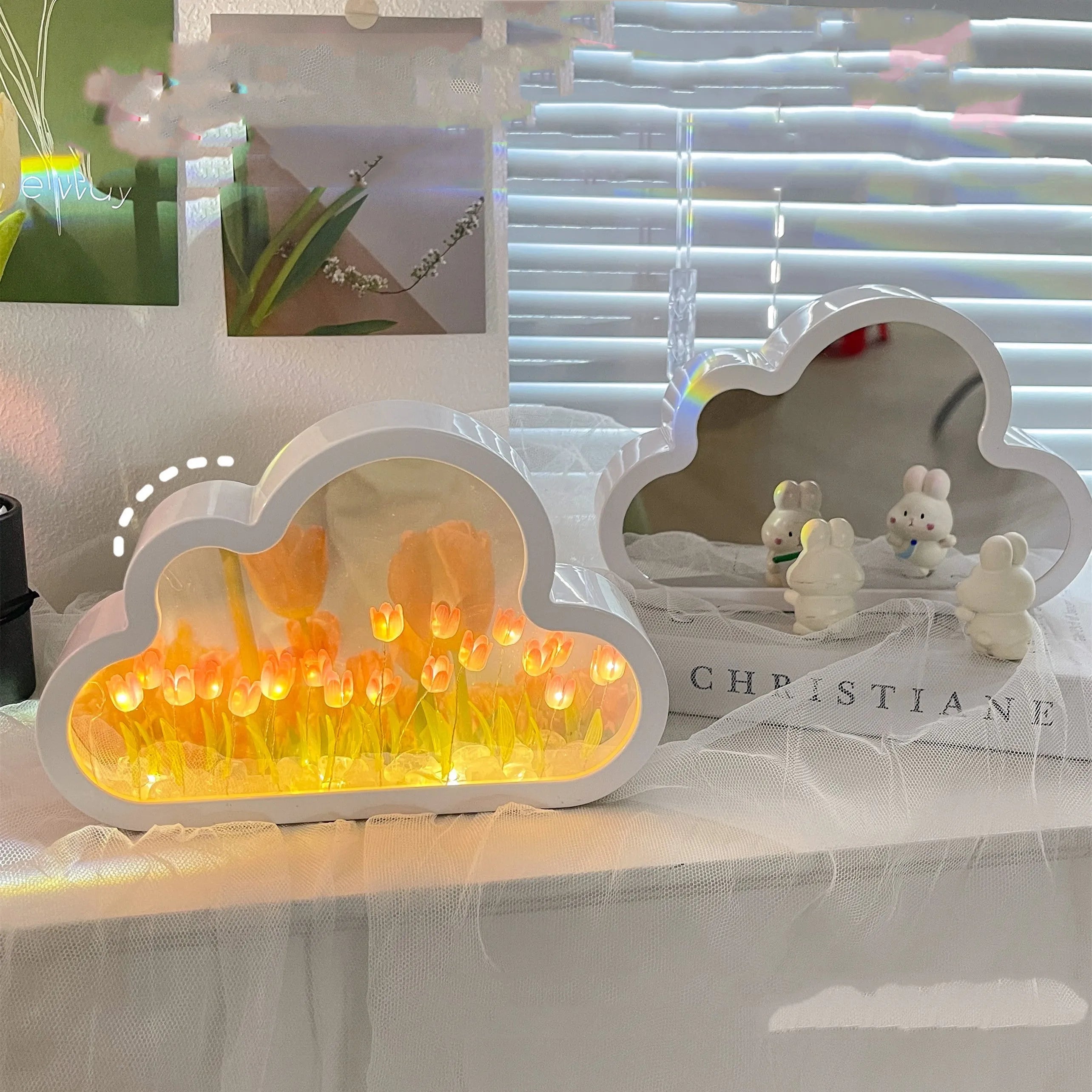 DIY cloud tulip night lamp kit with LED light, mirror, and photo frame on a desk