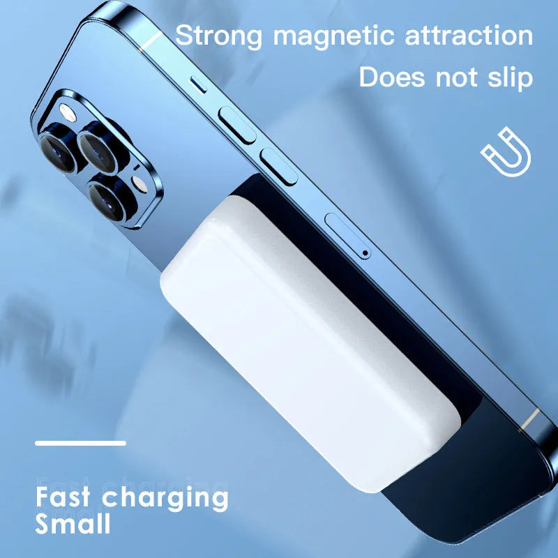 Pink magnetic wireless power bank on a table showing its compact size and charging surface.