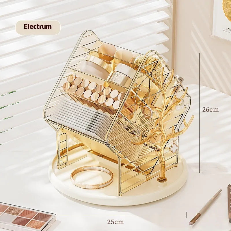 Clear and amber gold rotating plastic cosmetics storage box organiser on a table.