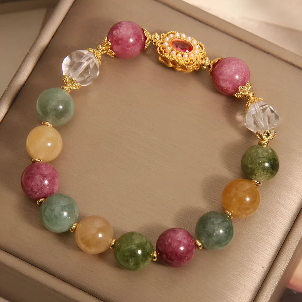 Jade colour tourmaline bracelet for women with round beads on pearl crystal base and rhinestone details