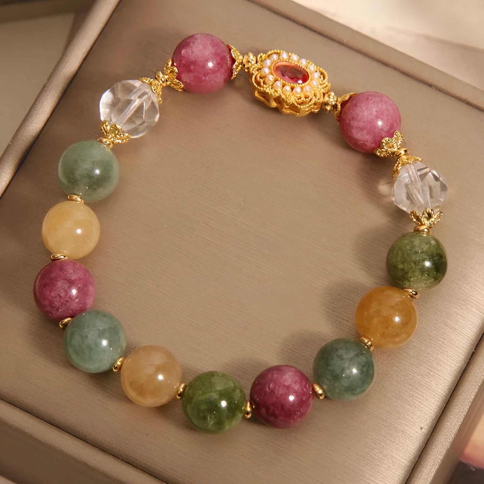 Jade colour tourmaline bracelet for women with round beads on pearl crystal base and rhinestone details