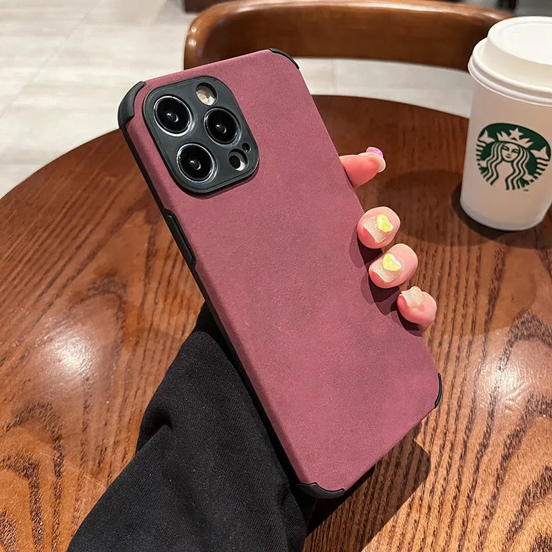Simple solid colour imitation leather fur phone case for iPhone 15 series.