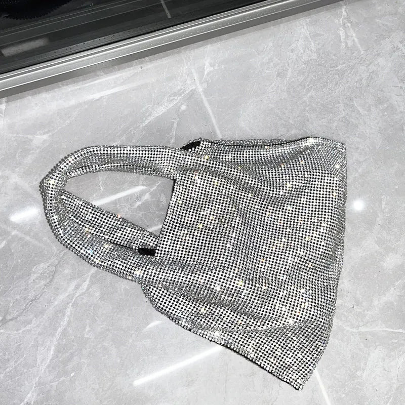 Silver evening handbag with shiny rhinestones and open pocket design made from cotton thread
