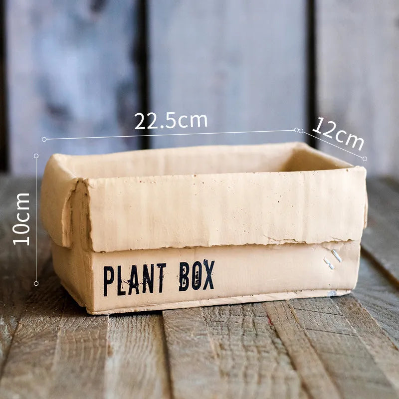 Cement flowerpot in Nordic style with bottom drainage holes on a floor