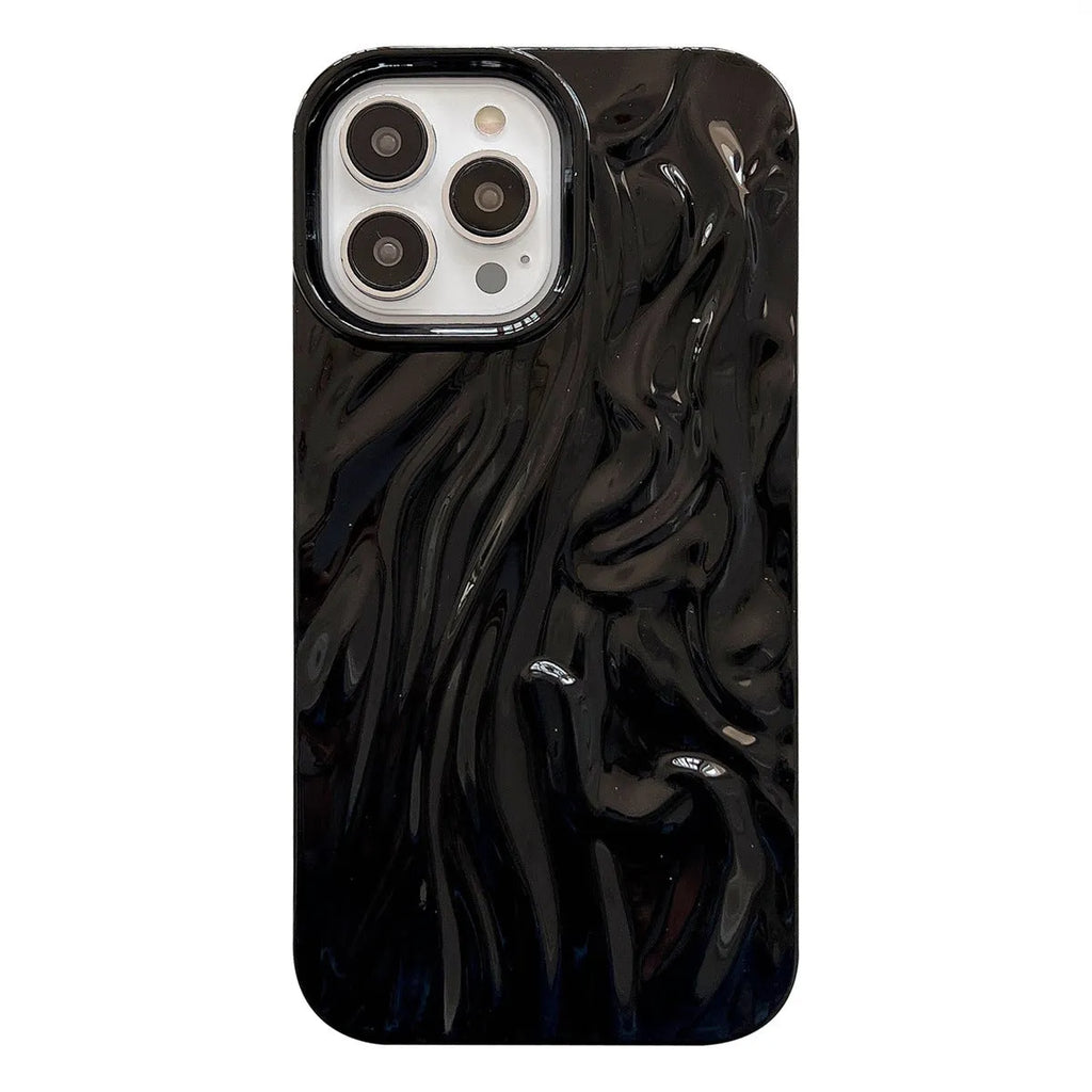 Solid colour water ripple texture silicone case for iPhone on a table.