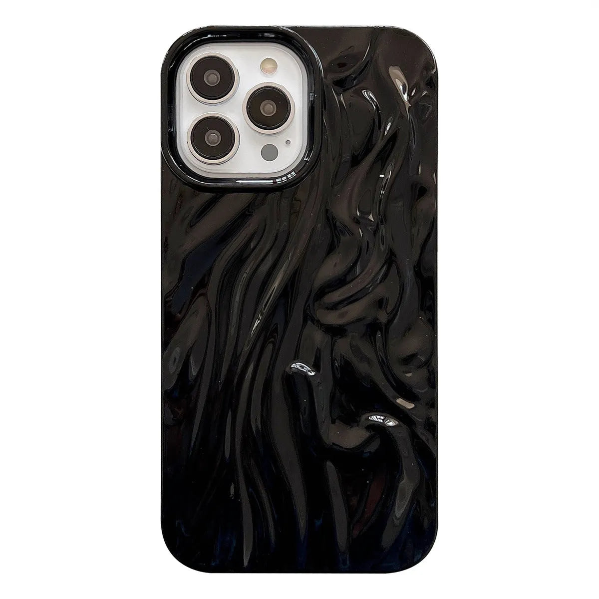 Solid colour water ripple texture silicone case for iPhone on a table.