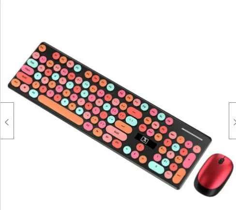 Vibrant yellow wireless punk manipulator style keyboard and mouse set on a desk.