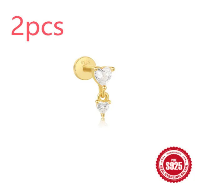 S925 sterling silver ear stud with XINGX inlaid tassel design in a gold colour.