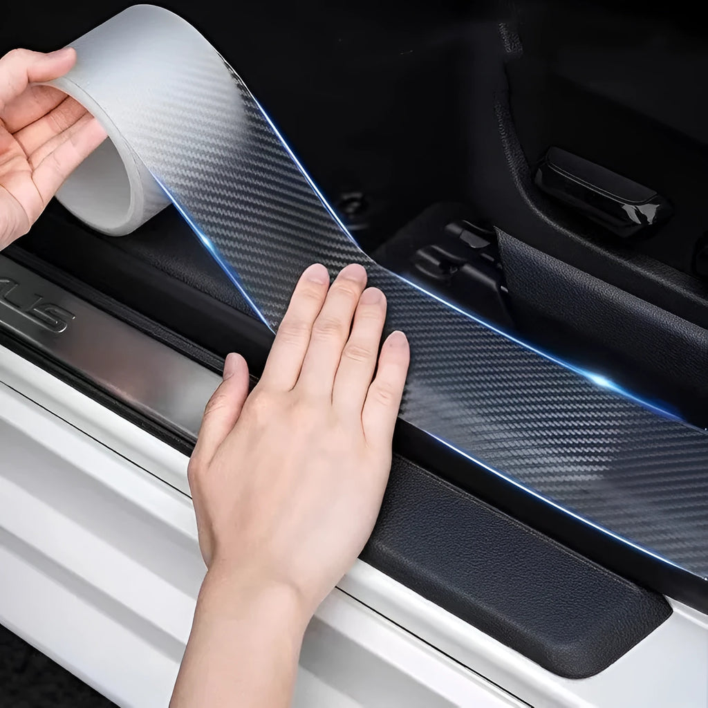 Clear carbon fibre grain car protection strip roll in various widths on a white background.