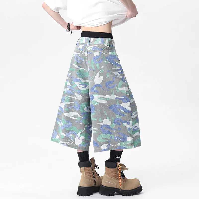 Men's camouflage green cotton cargo trousers with a straight cropped leg and a cargo pocket.