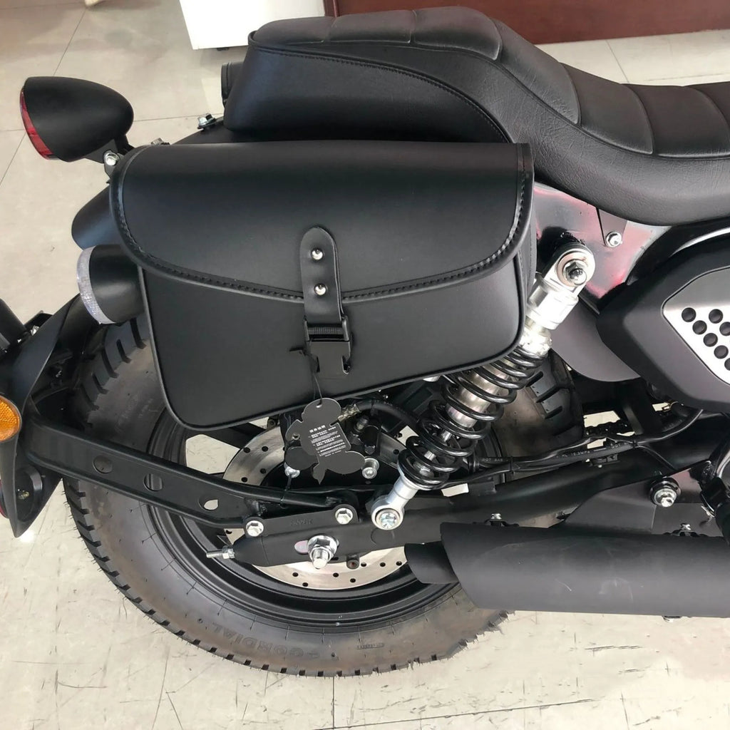 Black PU leather motorcycle swingarm saddlebag mounted on Sportster showing 30cm length dimensions