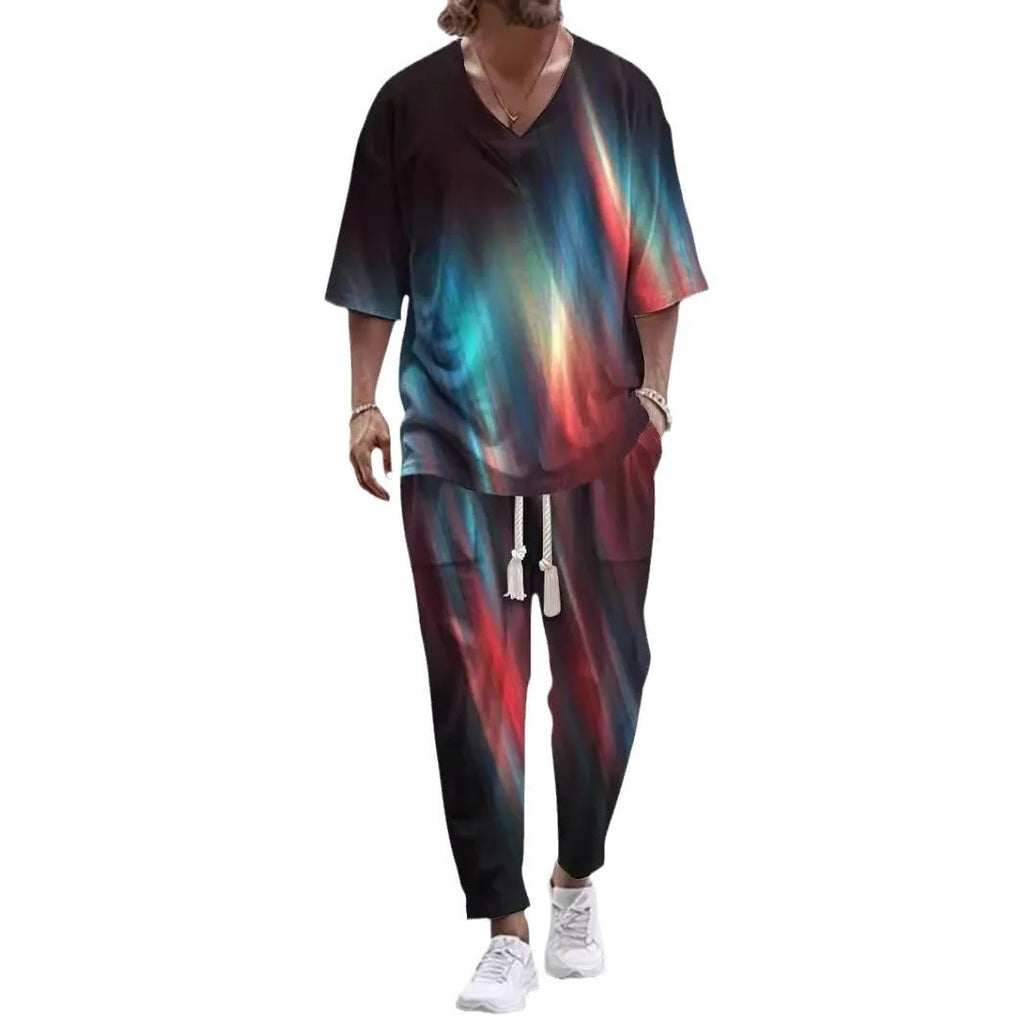 Lightweight polyester trousers suit with cropped sleeve V-neck jacket on a hanger.