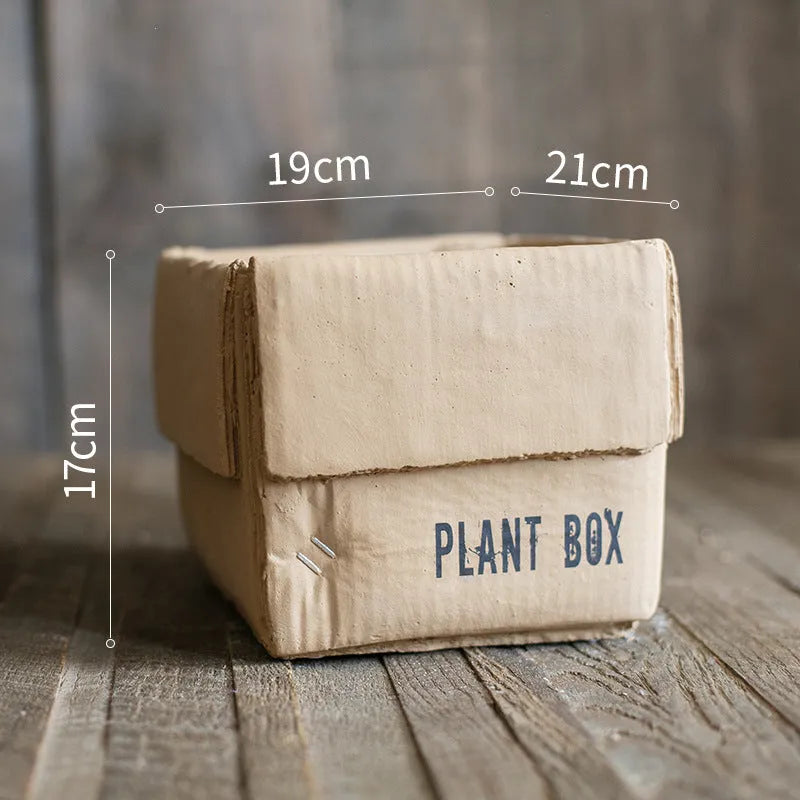 Cement flowerpot in Nordic style with bottom drainage holes on a floor