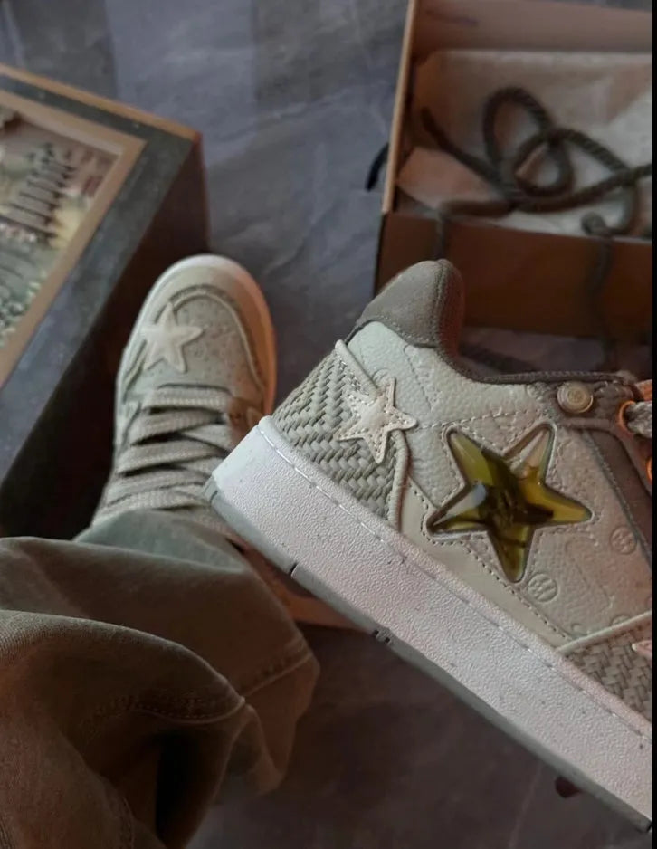 Green China-chic casual sneakers with a star pattern and white rubber sole.