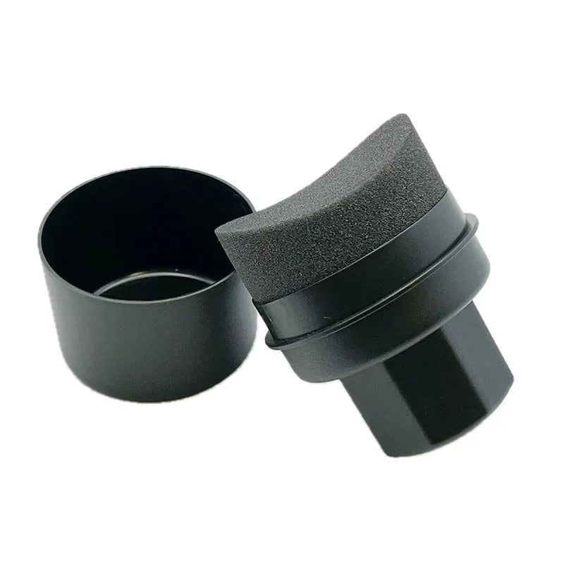 Black car tyre polishing sponge brush with high-density foam head and a white protective lid on a tyre.