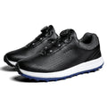 Men's white and black golf shoes with broken nail pattern soles and breathable design