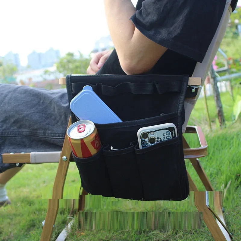 Canvas hanging storage bag for camping and travel, shown in black, beige apricot or green with armrest side attachment