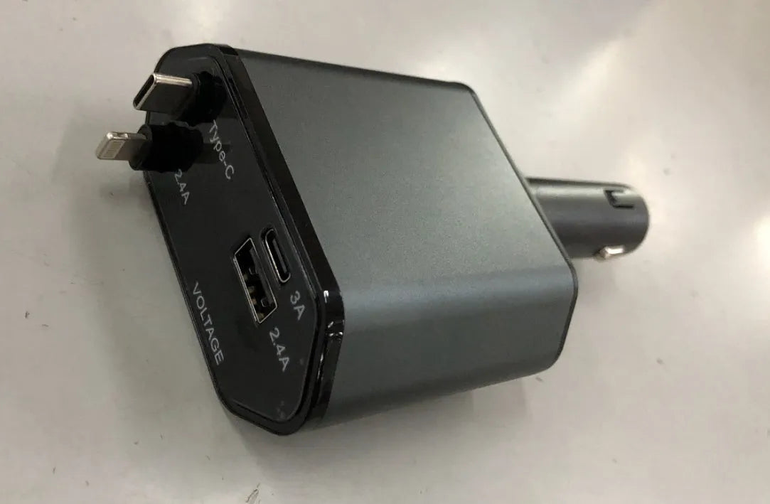 Automatic retractable car charger plugged into a vehicle cigarette lighter socket with its cable extended.