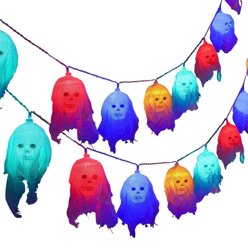 Battery-powered Halloween coloured LED string lights for indoor wall decoration.